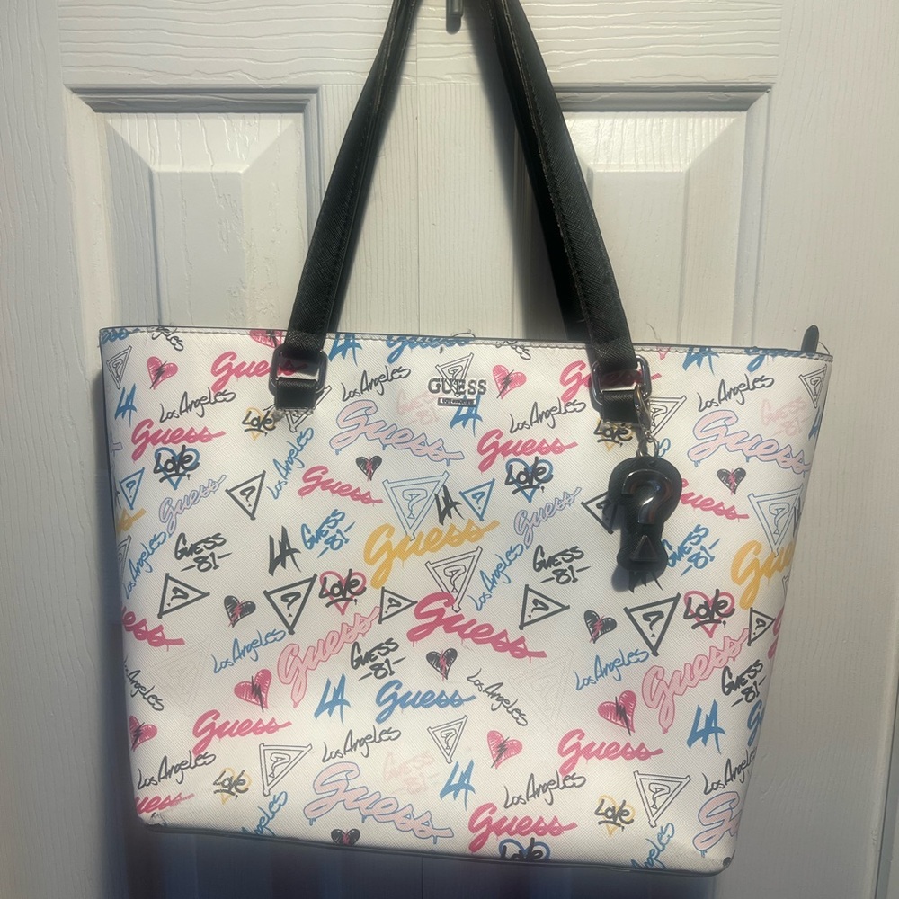 GUESS graffiti tote & wallet set.